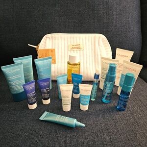 CLARINS travel sizes with pouch.